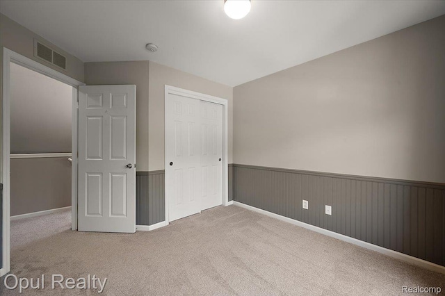 1978 Frances Way, Ypsilanti, MI 48198 - unfurnished bedroom featuring carpet flooring, a closet, and wainscoting