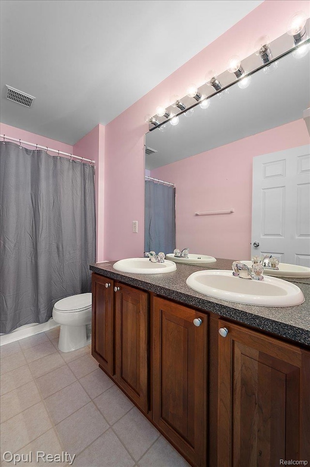 1978 Frances Way, Ypsilanti, MI 48198 - bathroom with double vanity, tile patterned floors, and a shower with shower curtain