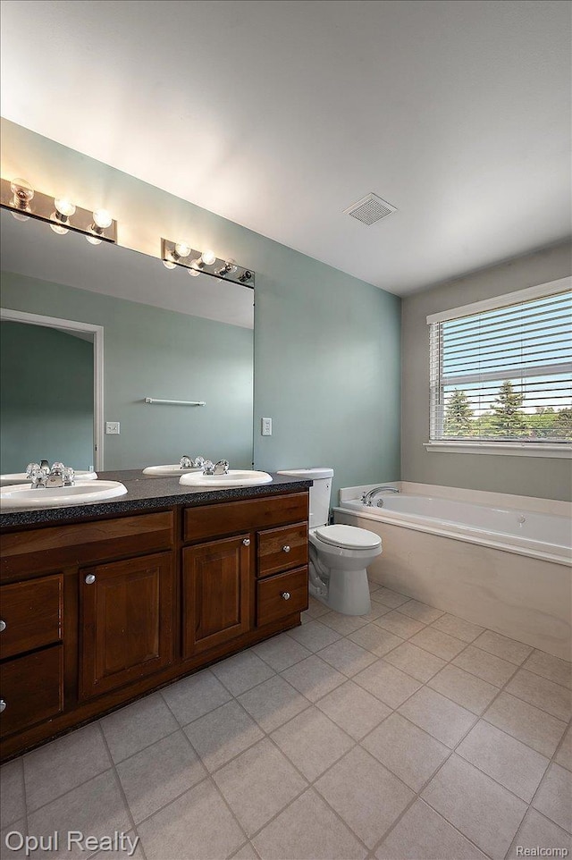 1978 Frances Way, Ypsilanti, MI 48198 - full bathroom with double vanity, a garden tub, and tile patterned floors
