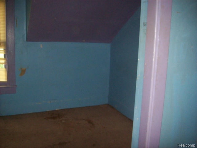 27 Clarence St, Pontiac, MI 48342 - additional living space with vaulted ceiling and carpet