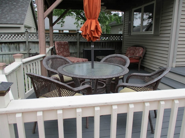 507 Mackinaw St, Durand, MI 48429 - wooden terrace featuring outdoor dining area