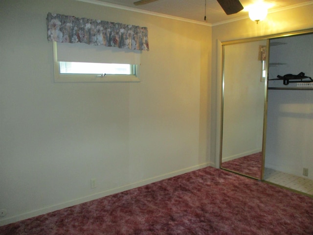 507 Mackinaw St, Durand, MI 48429 - unfurnished bedroom with crown molding, a closet, and carpet floors
