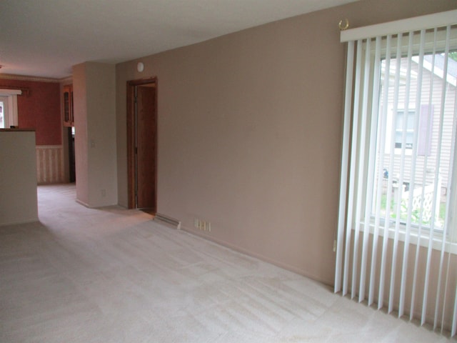 507 Mackinaw St, Durand, MI 48429 - unfurnished room featuring plenty of natural light and light colored carpet