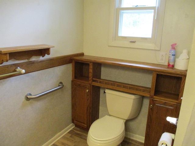 507 Mackinaw St, Durand, MI 48429 - half bathroom with wood finished floors and toilet