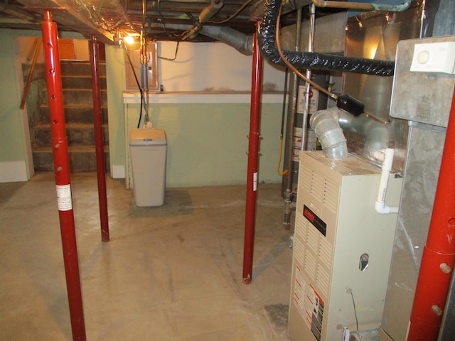 507 Mackinaw St, Durand, MI 48429 - unfinished below grade area featuring a water softener system and heating unit