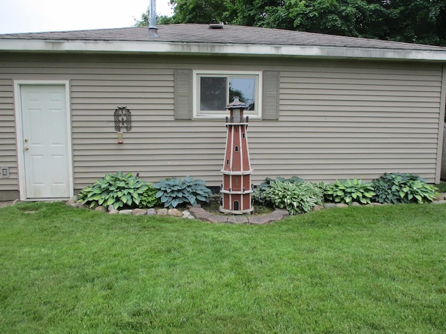 507 Mackinaw St, Durand, MI 48429 - view of property exterior with a lawn and a shingled roof