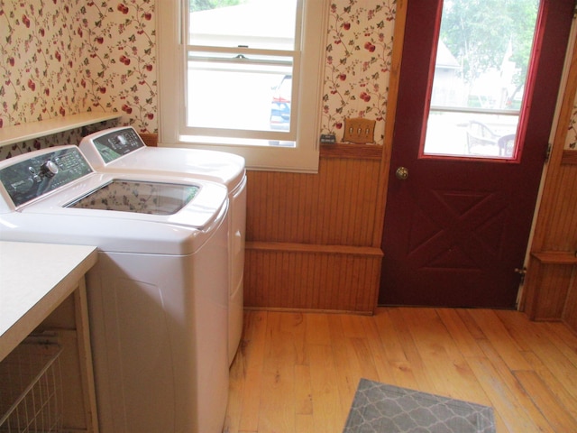 507 Mackinaw St, Durand, MI 48429 - laundry area with independent washer and dryer, wallpapered walls, and light wood-style floors