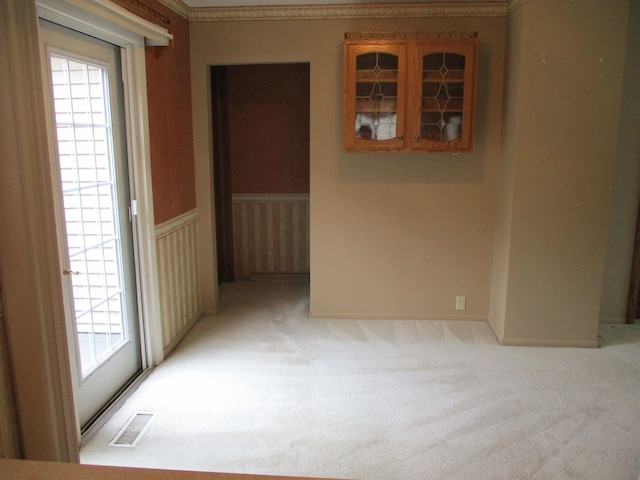 507 Mackinaw St, Durand, MI 48429 - empty room featuring light colored carpet and ornamental molding