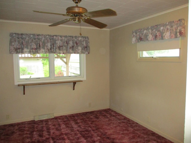 507 Mackinaw St, Durand, MI 48429 - carpeted spare room featuring crown molding and ceiling fan