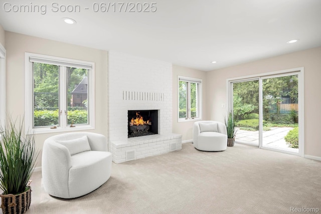 33 Oxford Blvd, Pleasant Ridge, MI 48069 - living area with a fireplace, carpet, healthy amount of natural light, and recessed lighting