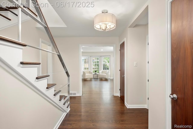 33 Oxford Blvd, Pleasant Ridge, MI 48069 - foyer entrance featuring stairs, dark wood-style floors, and a chandelier