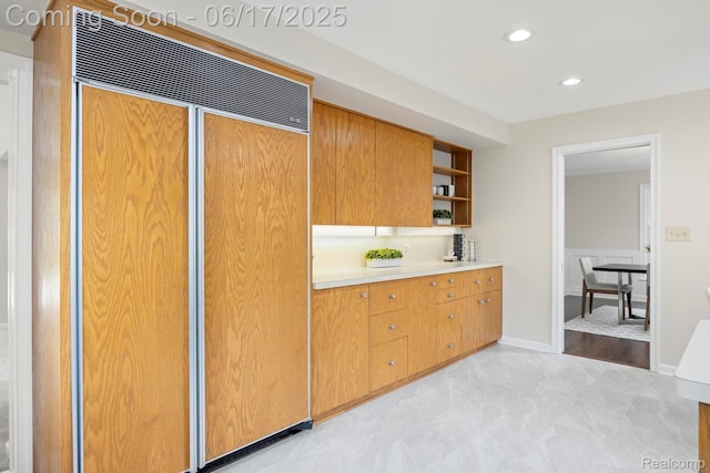 33 Oxford Blvd, Pleasant Ridge, MI 48069 - kitchen featuring paneled built in fridge, open shelves, recessed lighting, and light countertops
