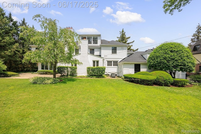 33 Oxford Blvd, Pleasant Ridge, MI 48069 - view of front of property with a front lawn and brick siding