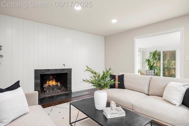 33 Oxford Blvd, Pleasant Ridge, MI 48069 - living area with wood finished floors, a lit fireplace, and recessed lighting