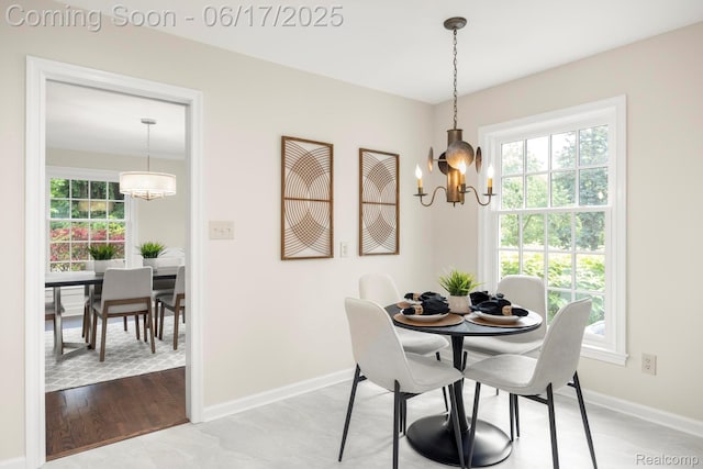 33 Oxford Blvd, Pleasant Ridge, MI 48069 - dining room with a chandelier and baseboards