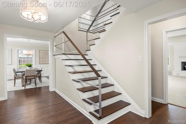 33 Oxford Blvd, Pleasant Ridge, MI 48069 - stairway featuring a chandelier and wood finished floors