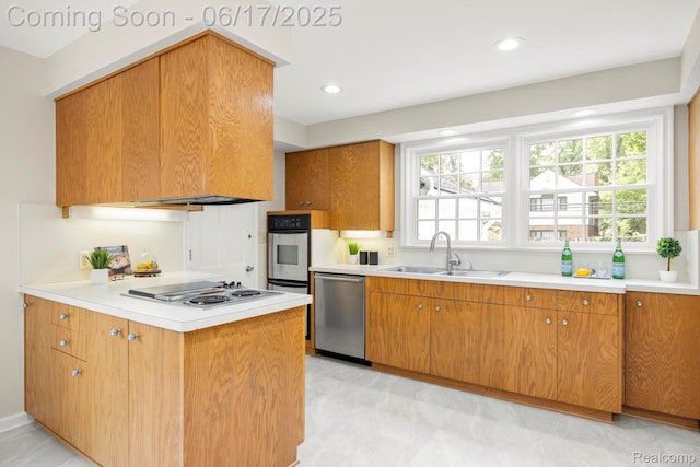 33 Oxford Blvd, Pleasant Ridge, MI 48069 - kitchen with stainless steel appliances, light countertops, recessed lighting, light flooring, and brown cabinetry