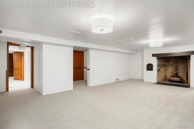 33 Oxford Blvd, Pleasant Ridge, MI 48069 - unfurnished living room featuring a fireplace and light colored carpet