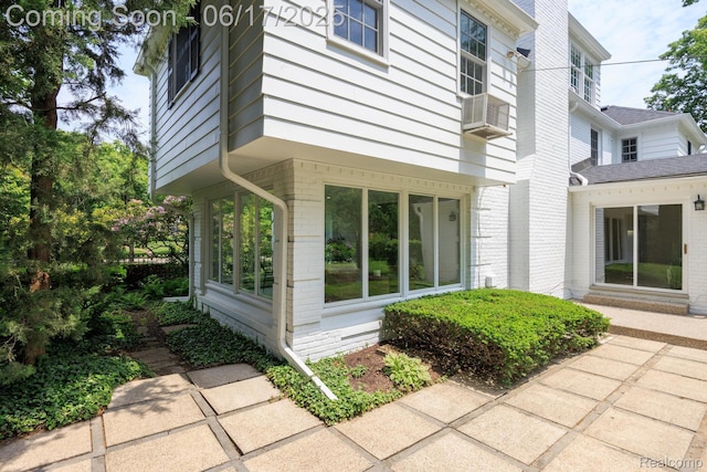 33 Oxford Blvd, Pleasant Ridge, MI 48069 - view of side of home with brick siding and cooling unit