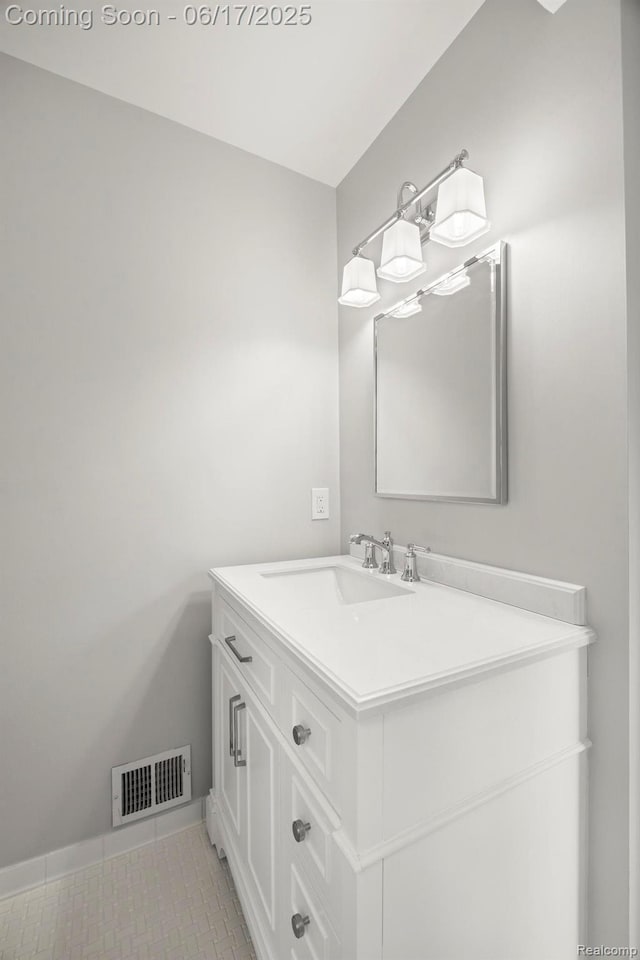 33 Oxford Blvd, Pleasant Ridge, MI 48069 - bathroom featuring vanity and tile patterned flooring