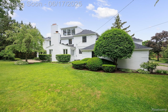 33 Oxford Blvd, Pleasant Ridge, MI 48069 - back of property featuring a chimney