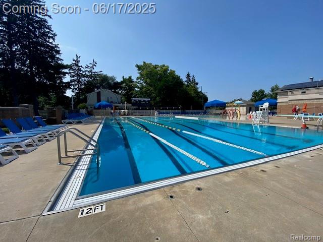 33 Oxford Blvd, Pleasant Ridge, MI 48069 - community pool featuring a patio area
