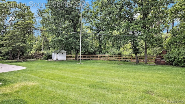 21556 Thorofare Rd, Trenton, MI 48138 - view of yard with a storage shed