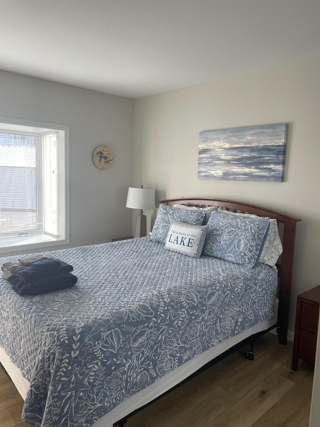 113 Millpoint Dr Unit 113, Spring Lake, MI 49456 - bedroom featuring wood finished floors