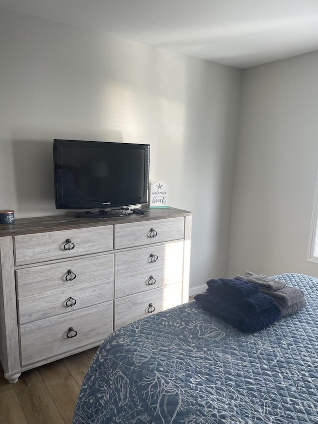 113 Millpoint Dr Unit 113, Spring Lake, MI 49456 - bedroom featuring dark wood finished floors