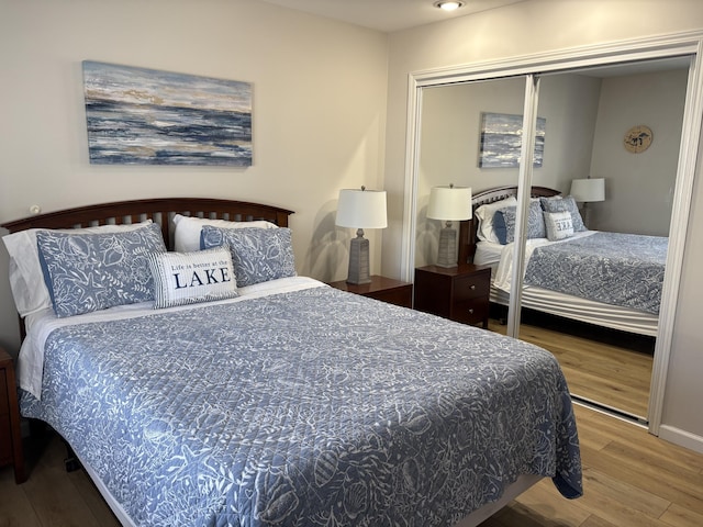 113 Millpoint Dr Unit 113, Spring Lake, MI 49456 - bedroom featuring wood finished floors and a closet