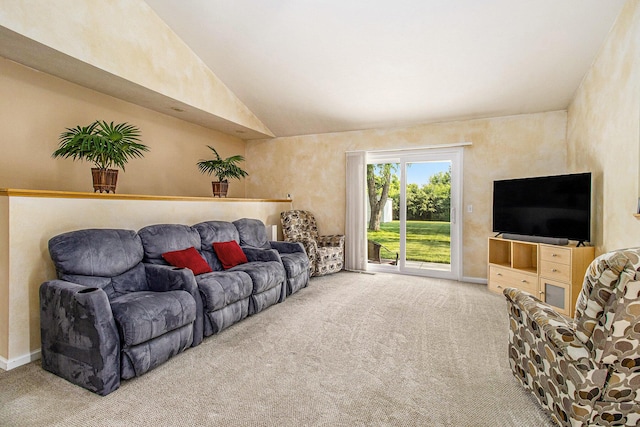 4497 Tiffany Ave, Portage, MI 49002 - carpeted living room featuring vaulted ceiling and baseboards