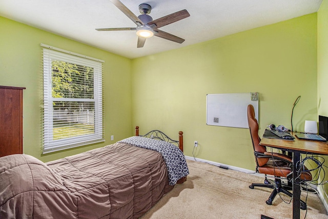 4497 Tiffany Ave, Portage, MI 49002 - carpeted bedroom featuring a desk and a ceiling fan