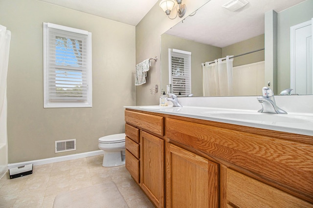4497 Tiffany Ave, Portage, MI 49002 - bathroom featuring double vanity, curtained shower, and tile patterned floors