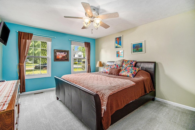 4497 Tiffany Ave, Portage, MI 49002 - bedroom with light colored carpet and a ceiling fan