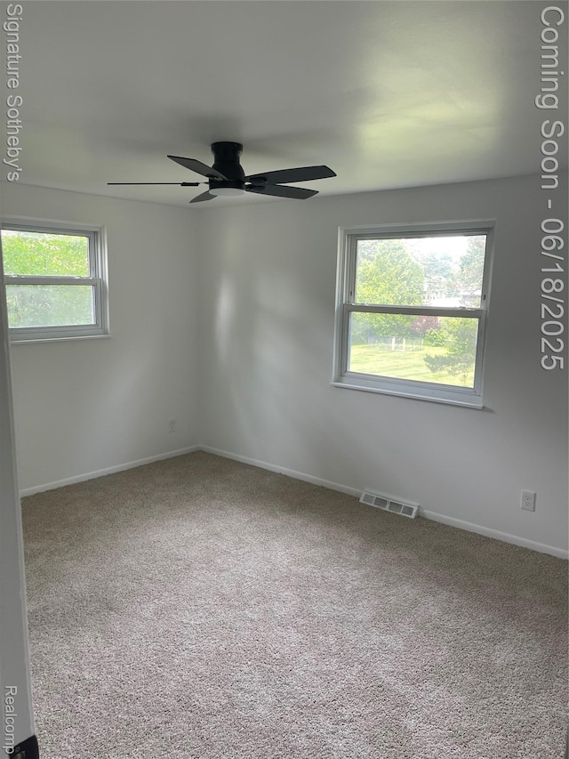 3834 Tara Dr, Highland, MI 48356 - spare room featuring carpet floors and ceiling fan