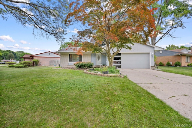 23870 Rockingham St, Southfield, MI 48033 - view of front of home with driveway, a garage, and brick siding
