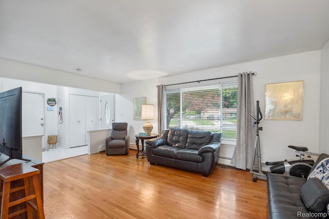 23870 Rockingham St, Southfield, MI 48033 - living area featuring light wood-style floors and baseboard heating