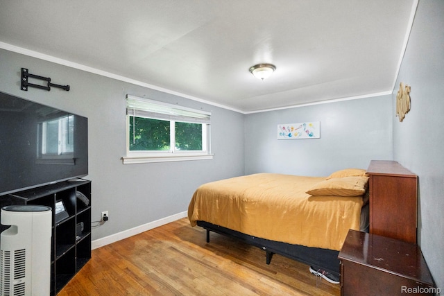 23870 Rockingham St, Southfield, MI 48033 - bedroom with wood finished floors and crown molding