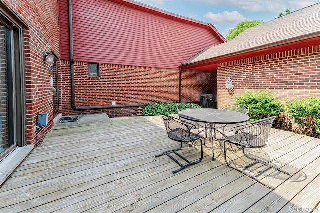 42134 Toddmark Ln, Clinton Township, MI 48038 - wooden deck featuring outdoor dining area