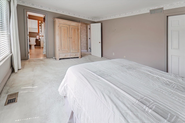 42134 Toddmark Ln, Clinton Township, MI 48038 - bedroom featuring light carpet and connected bathroom