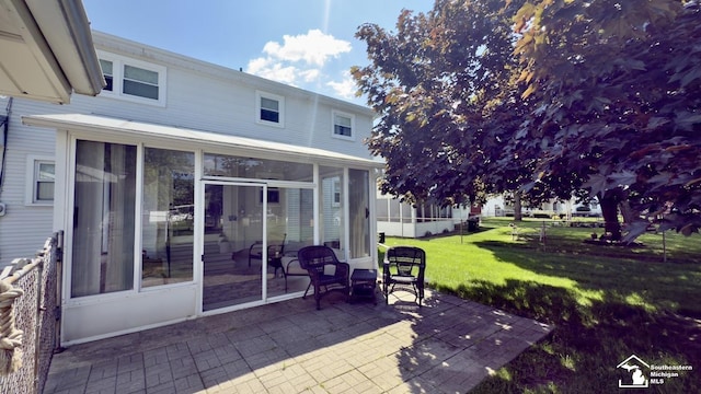 1107 Mccormick St, Monroe, MI 48162 - view of patio / terrace featuring a sunroom