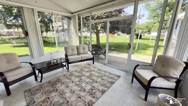 1107 Mccormick St, Monroe, MI 48162 - sunroom with vaulted ceiling and outdoor lounge area