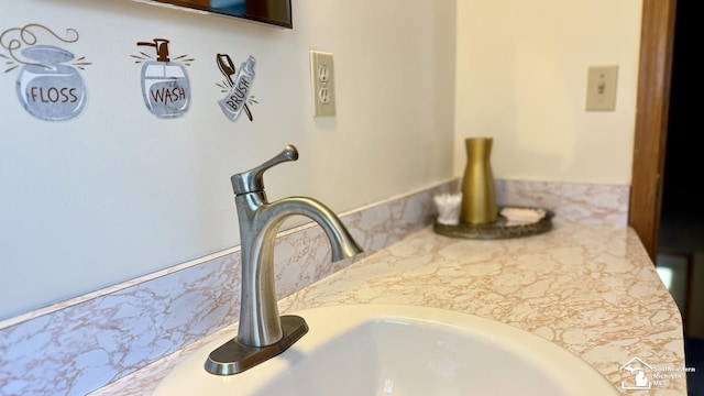1107 Mccormick St, Monroe, MI 48162 - detailed view of a sink and tasteful backsplash