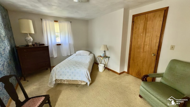 1107 Mccormick St, Monroe, MI 48162 - bedroom featuring light colored carpet and baseboards