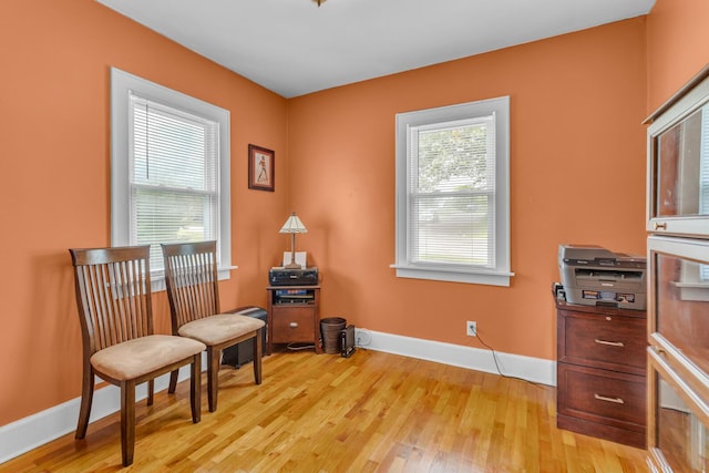 741 Lawrence St, Jackson, MI 49203 - sitting room with light wood finished floors and baseboards