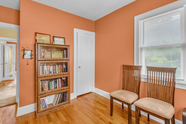 741 Lawrence St, Jackson, MI 49203 - sitting room with wood finished floors and baseboards
