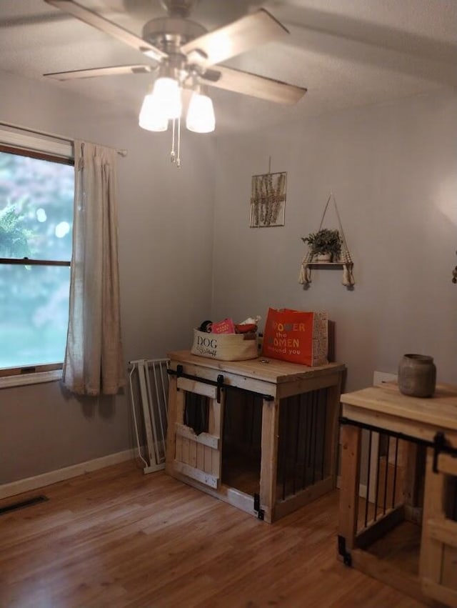 5664 Hall Rd, Muskegon, MI 49442 - dining area with ceiling fan and light wood finished floors