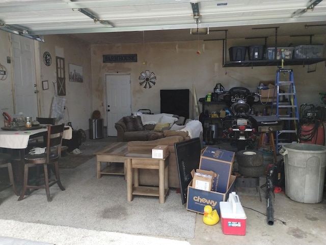 5664 Hall Rd, Muskegon, MI 49442 - garage with a garage door opener