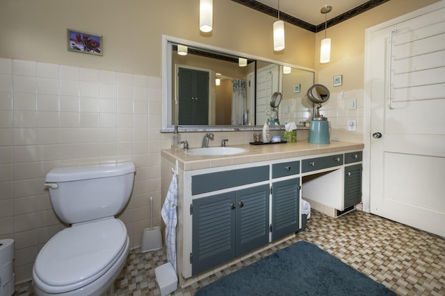 1217 Westmoorland St, Ypsilanti, MI 48197 - full bath featuring vanity, tile patterned floors, tile walls, and a shower with shower curtain