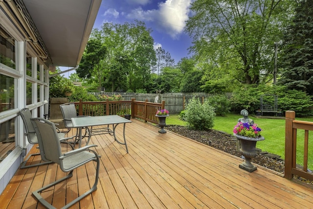 1217 Westmoorland St, Ypsilanti, MI 48197 - deck featuring a fenced backyard and view of wooded area